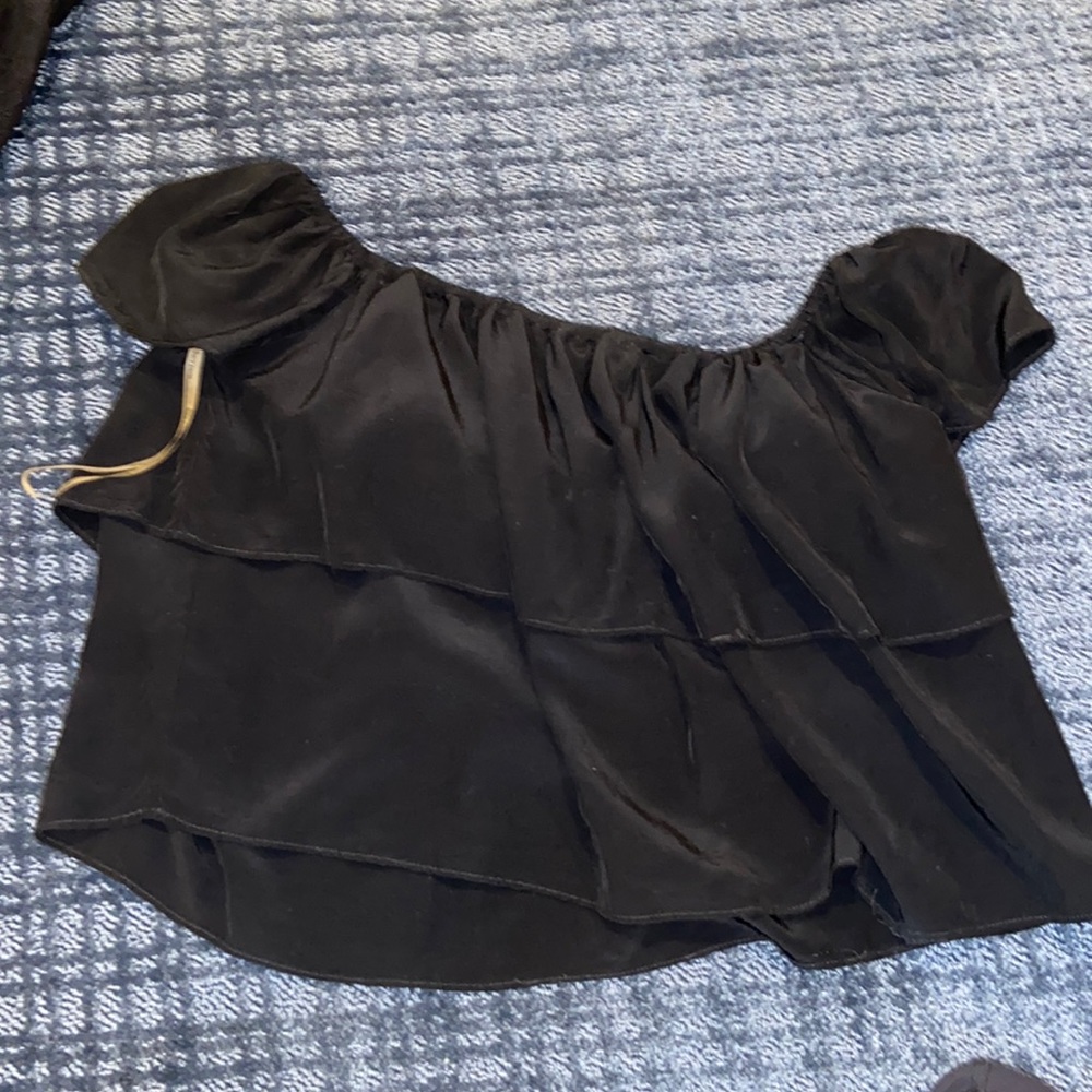 Black ruffle off the shoulder shirt